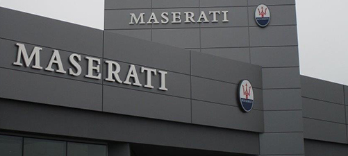 exterior view of Maserati logo on facility building